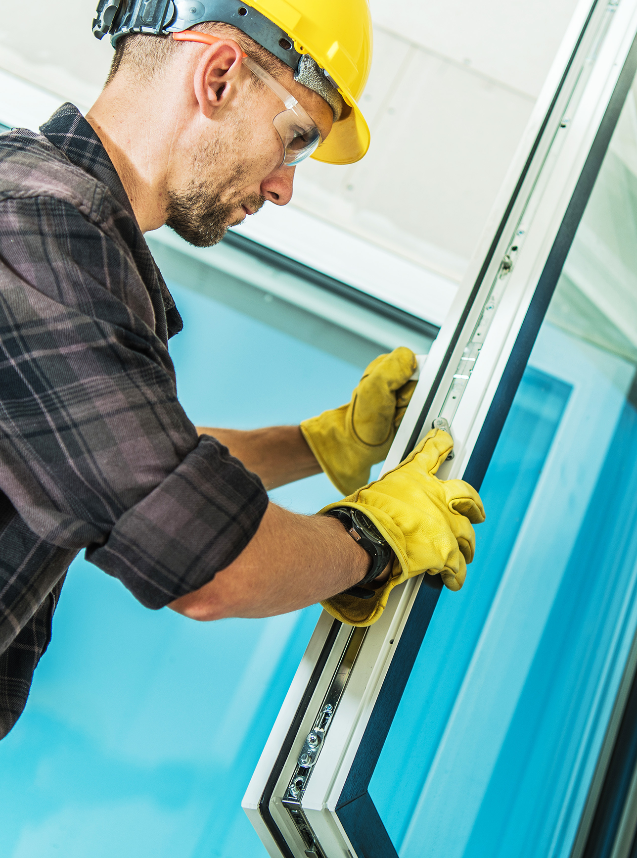 Contractor installing a window